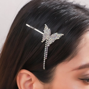 Elegant silver butterfly hair clip with shimmering rhinestones and long tassel chains