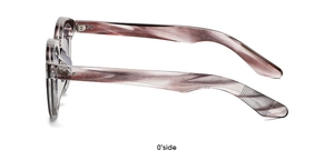 Side view of pink translucent round sunglasses featuring high-quality acetate frames