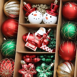 70-piece Christmas ornament set with red and gold balls in a partitioned storage box