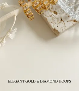 Close-up of gold titanium steel ring with sparkling baguette-cut cubic zirconia inlays