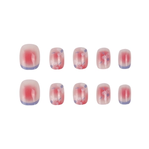 Short pink blush gradient press-on nails with purple camellia flowers and French tips