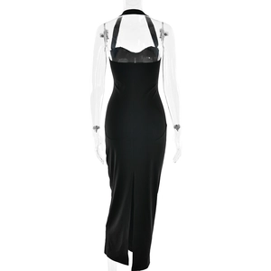 Back view of black halter neck maxi dress with a slit, displayed on a mannequin