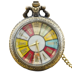 Vintage bronze pocket watch with colorful roman numeral dial and metal chain links
