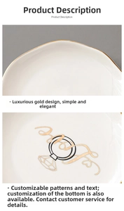 Detail of irregular white ceramic jewelry tray with gold rim and diamond ring motif