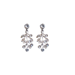 Elegant silver leaf drop earrings with crystal stones for a minimalist aesthetic