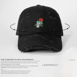 Distressed black baseball cap with skeleton hand rose embroidery and size measurement guide