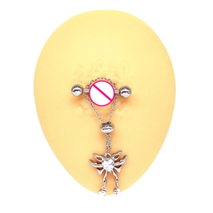 Detailed view of a silver heart butterfly nipple ring with rhinestones on a silicone model