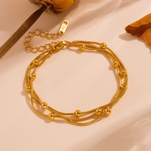 Three-layer gold stainless steel snake chain bracelet with elegant bead accents