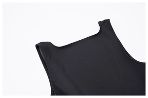 Close-up of square neckline and flat seams on black athletic yoga bodysuit