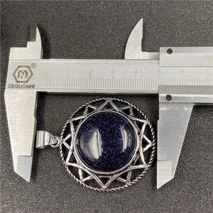 Blue goldstone hexagram pendant in silver bezel measured at 38mm with a caliper