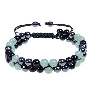Detail of adjustable double-layer beaded bracelet with amethyst and magnetic hematite beads