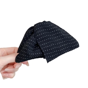 Acrylic triangular claw clip with black and white polka dot fabric for hair styling