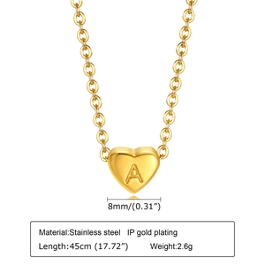 Detail of a 45cm gold stainless steel heart necklace featuring an engraved letter A