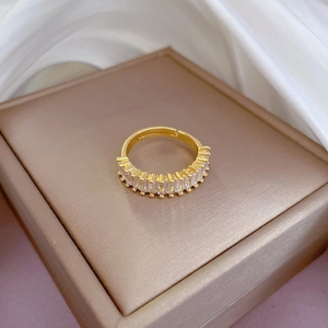 Gold plated adjustable open ring featuring minimalist rectangular zircon stones on display