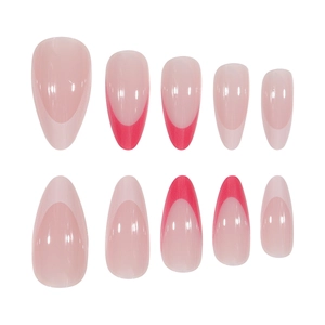 French almond press-on nails with nude base and deep red tips in a set of ten