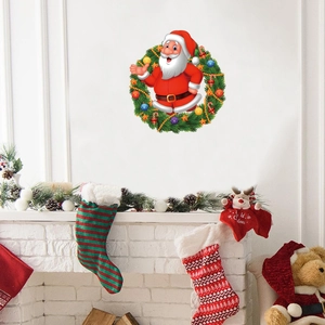Christmas Santa Claus wreath wall sticker decorating a white wall above a festive fireplace