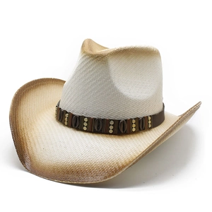 Detail of western straw cowboy hat with gradient finish and shell-studded leather band