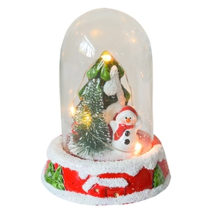 Lighted Christmas snow globe with snowman, LED string lights and red base for holiday decor