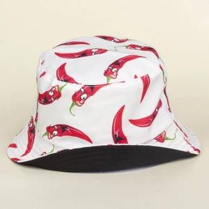 Detail view of cartoon chili pattern on white bucket hat with black inner brim