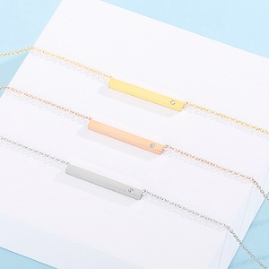 Three-piece titanium steel jewelry set with vertical bar pendants in gold rose gold silver