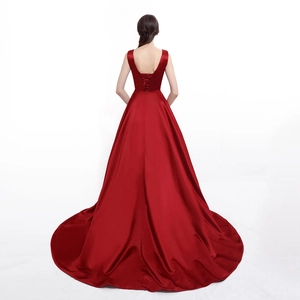 Elegant red satin evening gown featuring a U-shaped backless design and long floor-length train