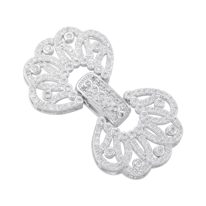 Detailed macro view of silver cubic zirconia encrusted fan-shaped jewelry connector clasp