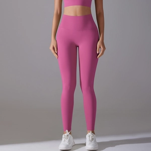 Detail showing high waist fit and seamless front of pink stretch yoga leggings for women