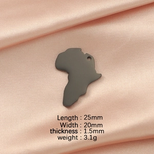 Detailed macro view of black Africa map pendant on pink silk with size dimensions