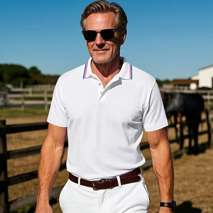 Detail of white cotton polo shirt with distinctive red white and blue striped collar trim