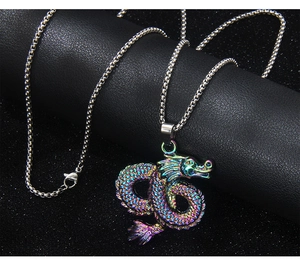 Detailed macro view of a colorful rainbow dragon pendant on a silver stainless steel chain
