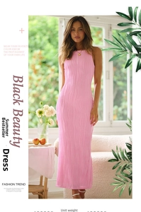 Detail showing the vertical wavy texture and sleek fabric of the pink sleeveless maxi dress