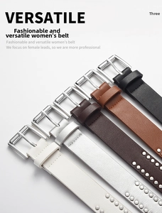 Detail view of stylish PU leather belts with metal studs and shiny square pin buckles