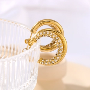 Elegant 18K gold-plated C-shaped twist hoop earrings with sparkling rhinestones for women