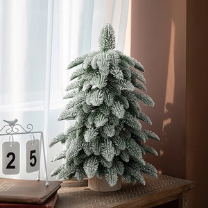 Flocked 55cm artificial Christmas tree with green PE needles and rustic wooden base