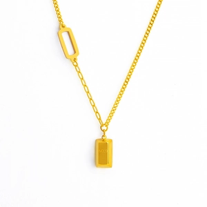 Titanium gold bar pendant necklace featuring engraved GOLD text on a dainty link chain