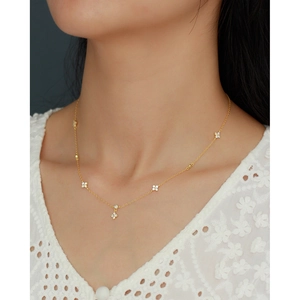 Elegant gold S925 silver layered necklace with sparkling clover charms for women