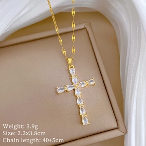 Detail of cross pendant with marquise-cut stones and jewelry size specifications
