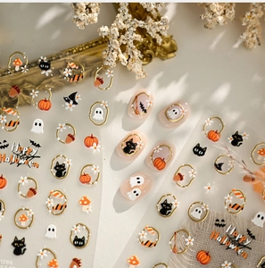 Detailed 3D embossed Halloween nail stickers with gold framed pumpkin and black cat motifs