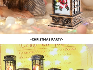 Close-up of vintage bronze Christmas telephone booth lanterns with LED scenes