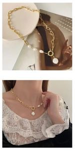 Baroque pearl pendant necklace on gold chain with lifestyle view and detailed texture