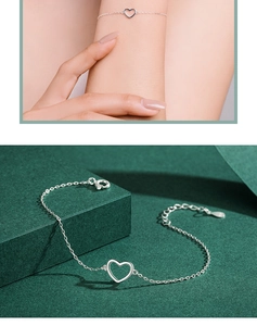 Detailed view of S925 sterling silver minimalist hollow heart bracelet with lobster clasp