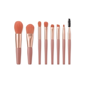 8pcs pink makeup brush set with rose gold ferrules and orange bristles on white background