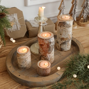 Set of four birch wood tea light candle holders for rustic Christmas home decoration