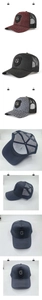 Detail view of breathable mesh trucker hats with metal G logo and adjustable snap closure