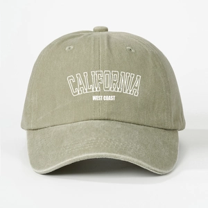 Detailed texture of washed khaki cotton baseball cap with white California embroidery