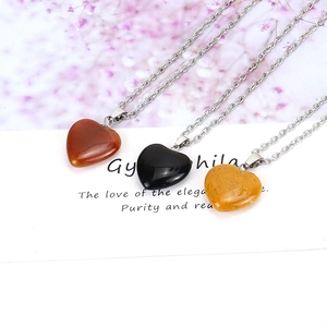 Natural faceted heart stone pendants with silver necklaces in red, black, and yellow
