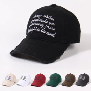 Close-up of baseball caps with embroidery and distressed brims in seven various colors