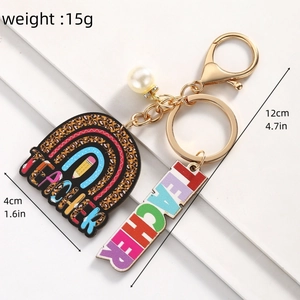 Detailed view of teacher leopard rainbow keychain with size specs and gold pearls