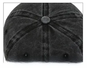 Detailed top view of a washed cotton baseball cap showing reinforced six-panel stitching