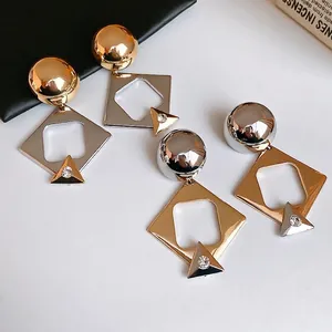 Geometric silver needle earrings with oversized square drops and rhinestone accents